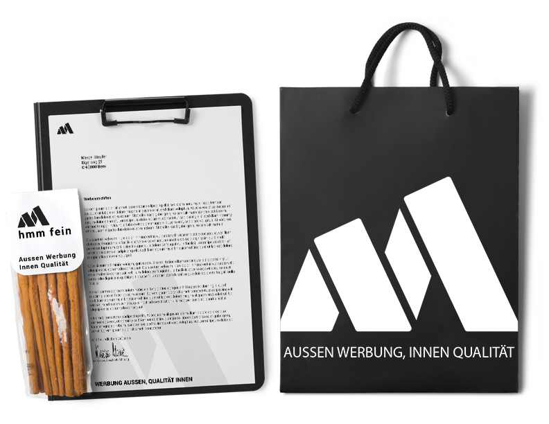 Corporate Design Abbildungen von A4 Briefpapier und einer Tüte